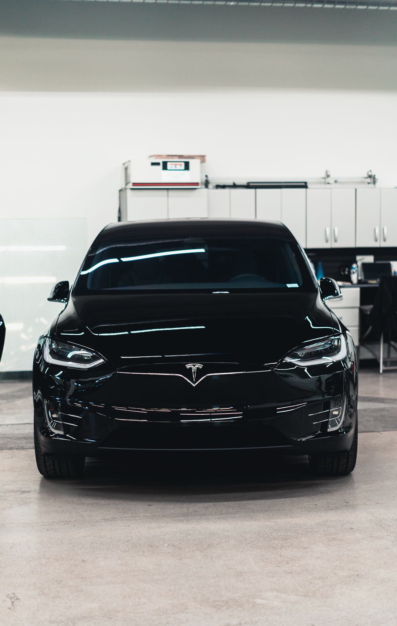Tinted glass on a black Tesla Model X