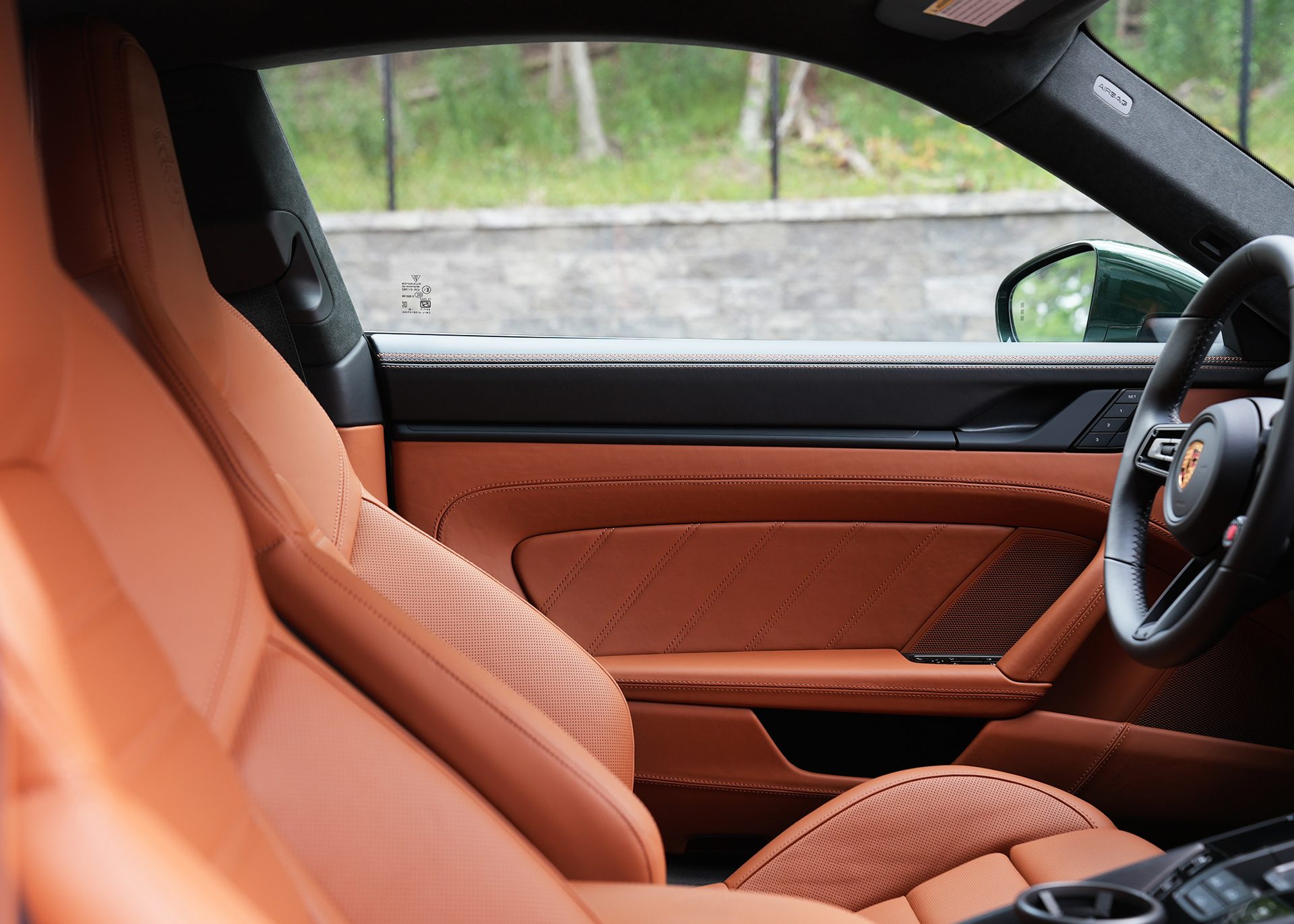 Porsche 911 cabin looking out through the side glass
